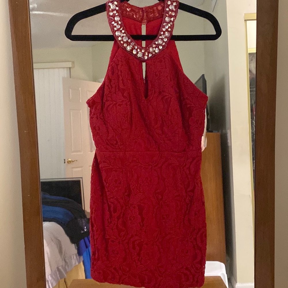 Little red dress, lacy and petite with silver rhinestones around the neck size L